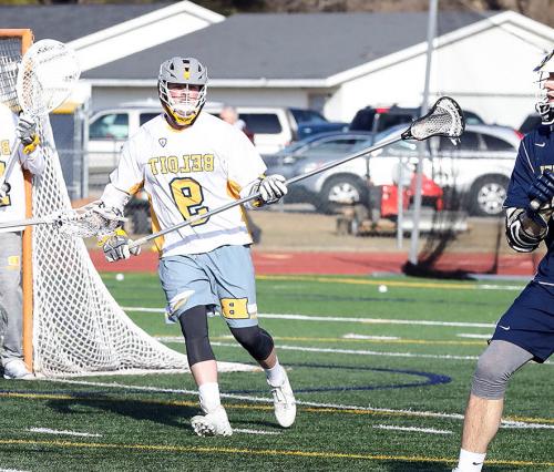 Ian Jacobs'22 playing lacrosse for the Beloit Bucs